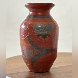Handcrafted carved Terracotta Vase with Black Accents ancient bird design